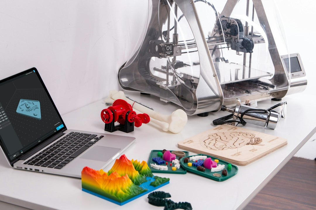 3D printer creating a prototype in an engineering workspace