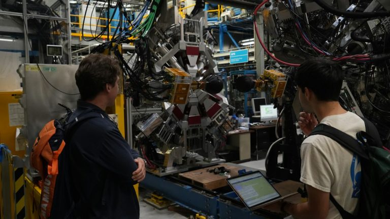 Research team working in an advanced technology laboratory